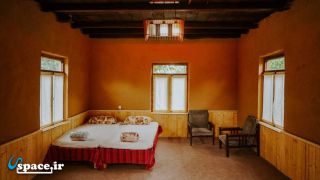 نمای داخلی اتاق کلبه اقامتگاه بوم گردی نارنجستان شهسوار - خرم آباد تنکابن - روستای تشگون